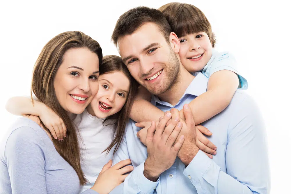 a family with a beautiful smile because they chose a great family dentist