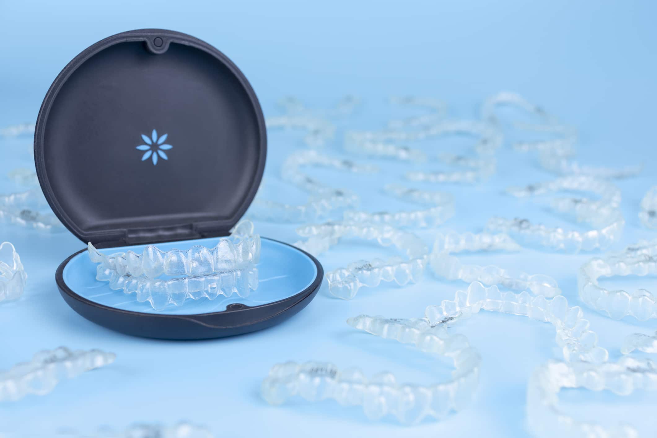 Invisalign Clear Aligners in official Invisalign blue case.